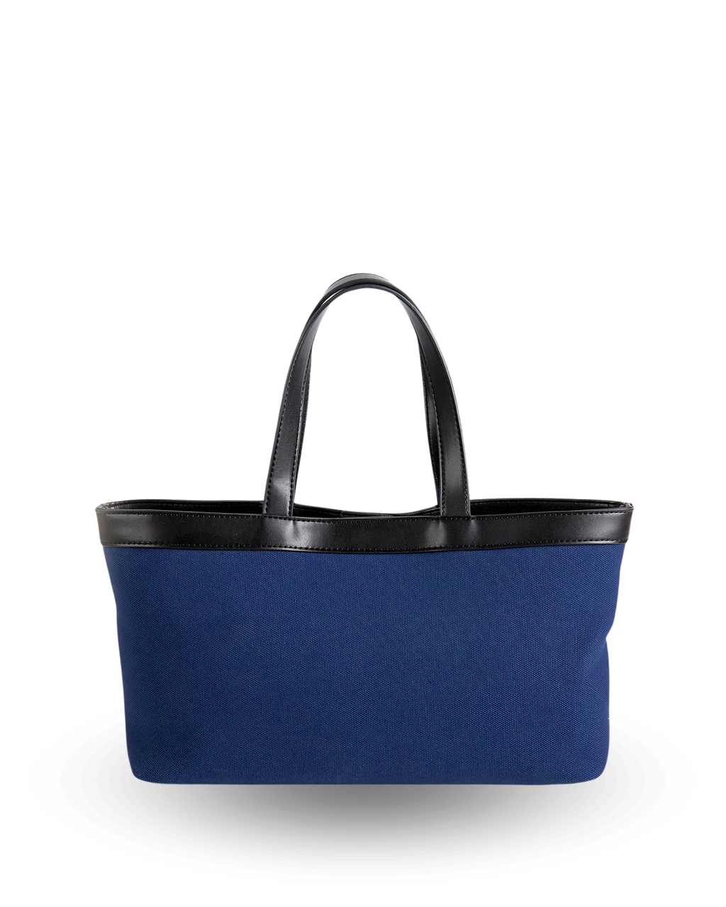 Rectangular navy canvas tote with a flat base, straight structured sides, and black vegan leather trim along the top edge, finished with short dual handles for a sleek, classic silhouette.