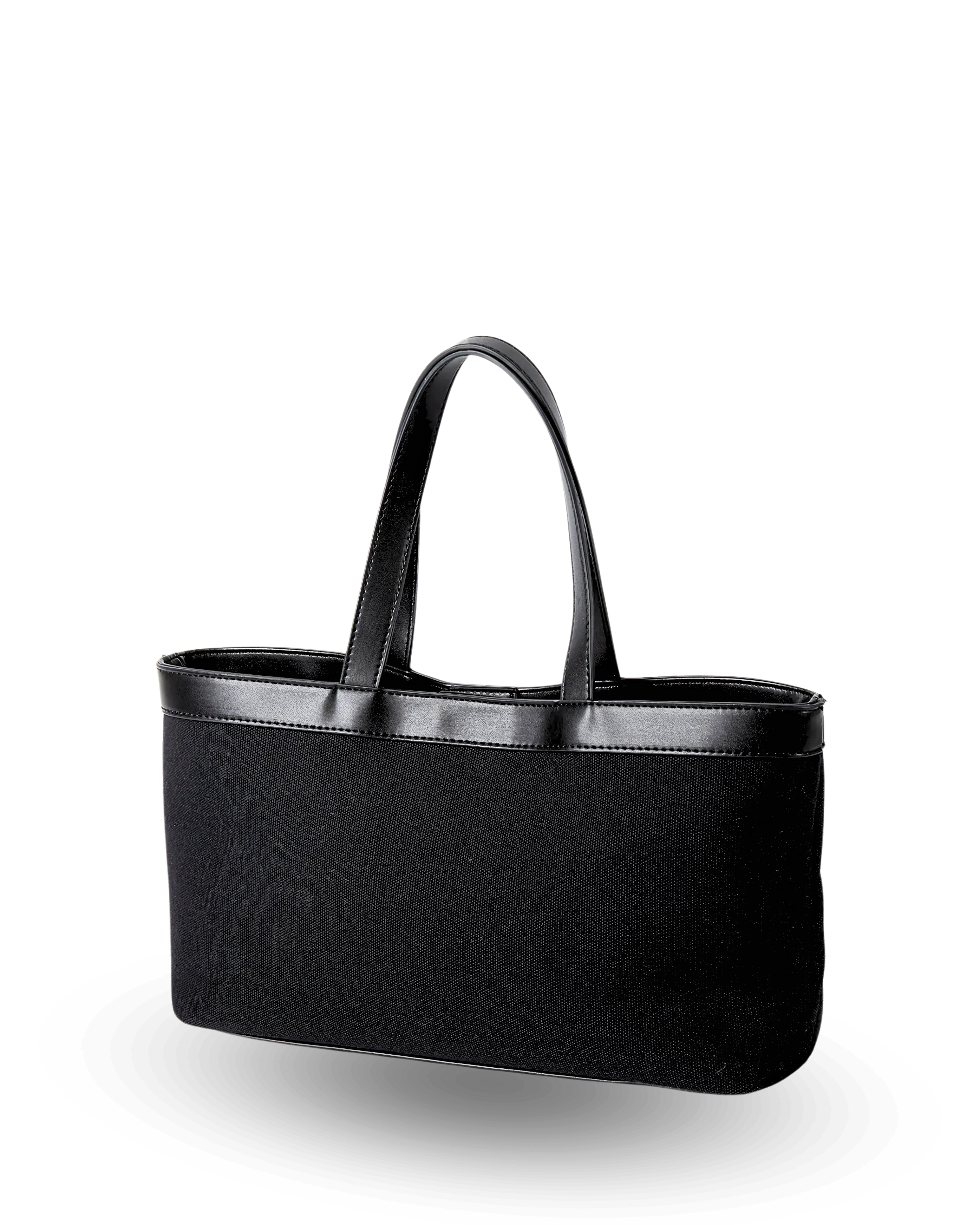 Rectangular black canvas tote with a flat base, straight structured sides, and black vegan leather trim along the top edge, finished with short dual handles for a sleek, classic silhouette.