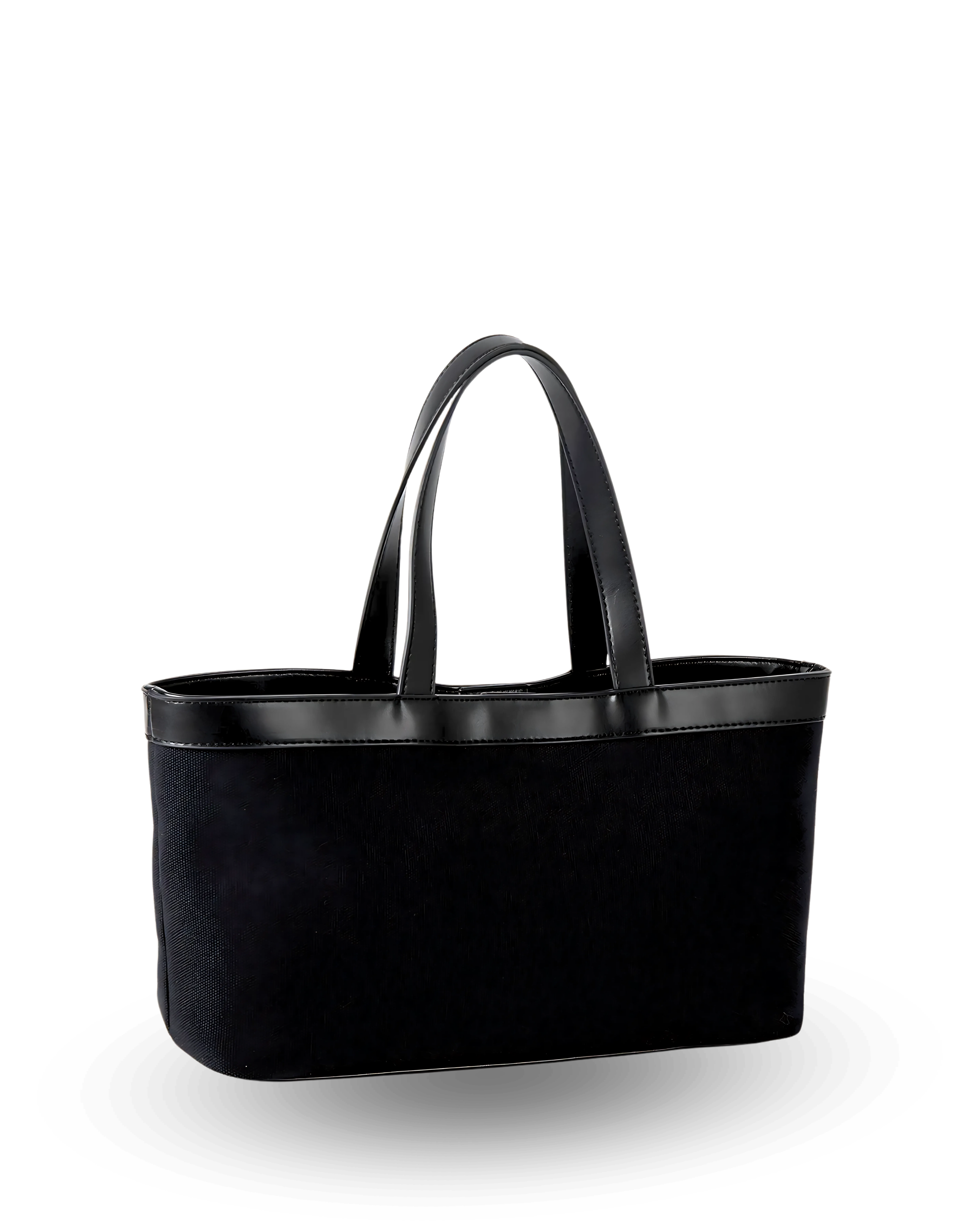 Rectangular black canvas tote with a flat base, straight structured sides, and black vegan leather trim along the top edge, finished with short dual handles for a sleek, classic silhouette.