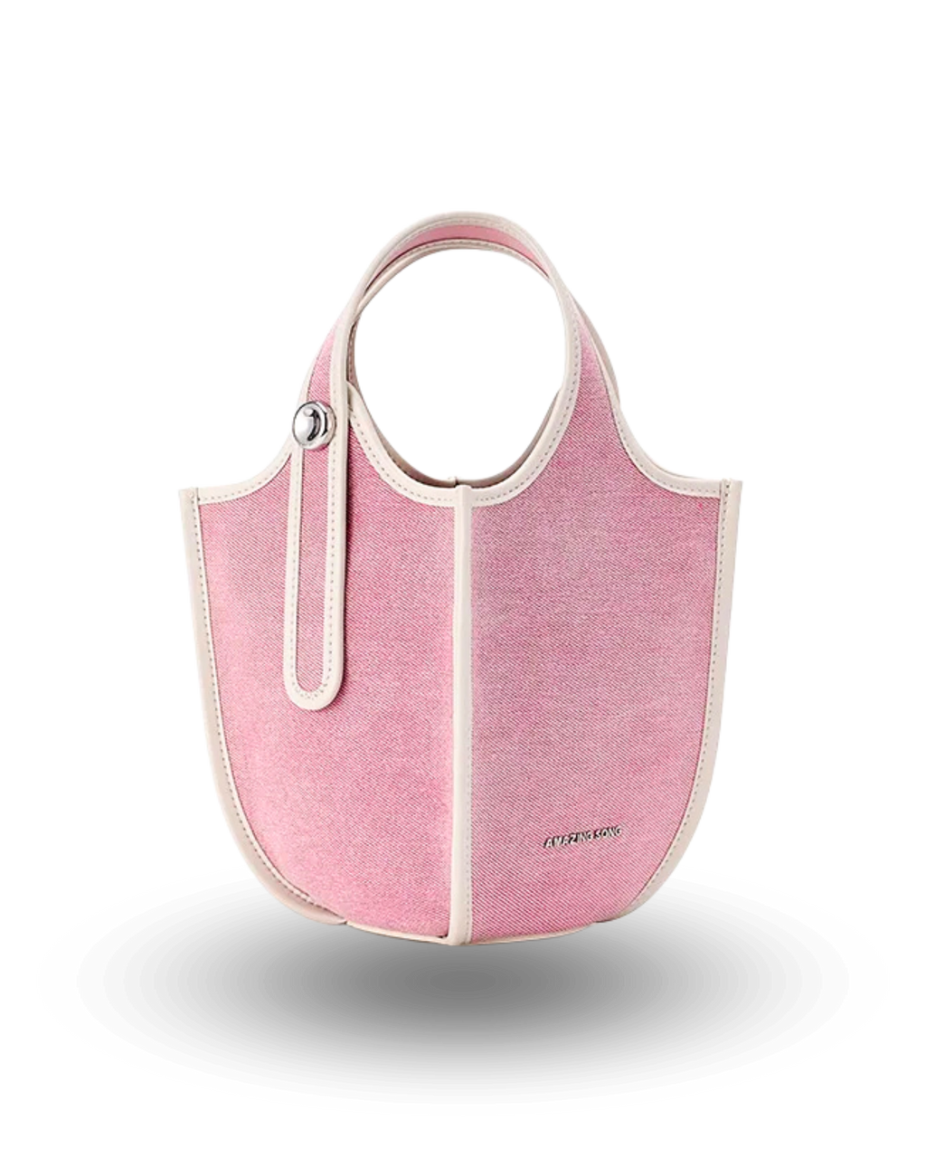 Pink canvas bucket handbag with cream contrast trim, round top handles, and structured design.