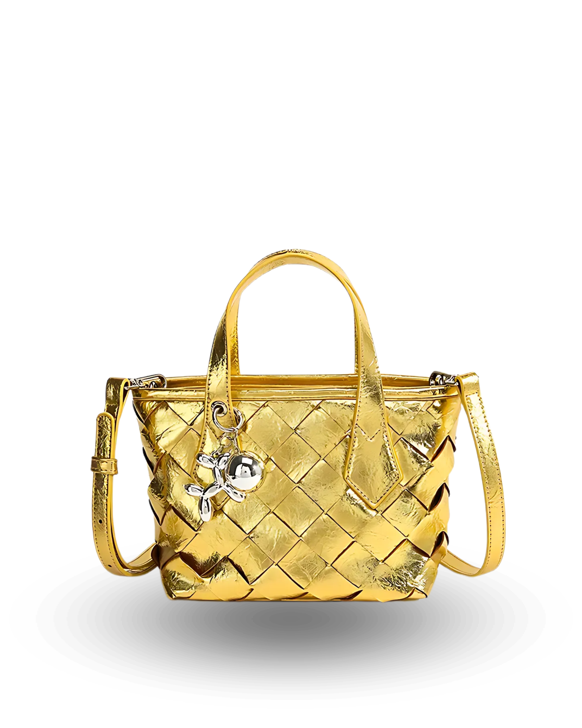 Gold quilted handbag with dual top handles, detachable crossbody strap, and silver charm keychain accent.