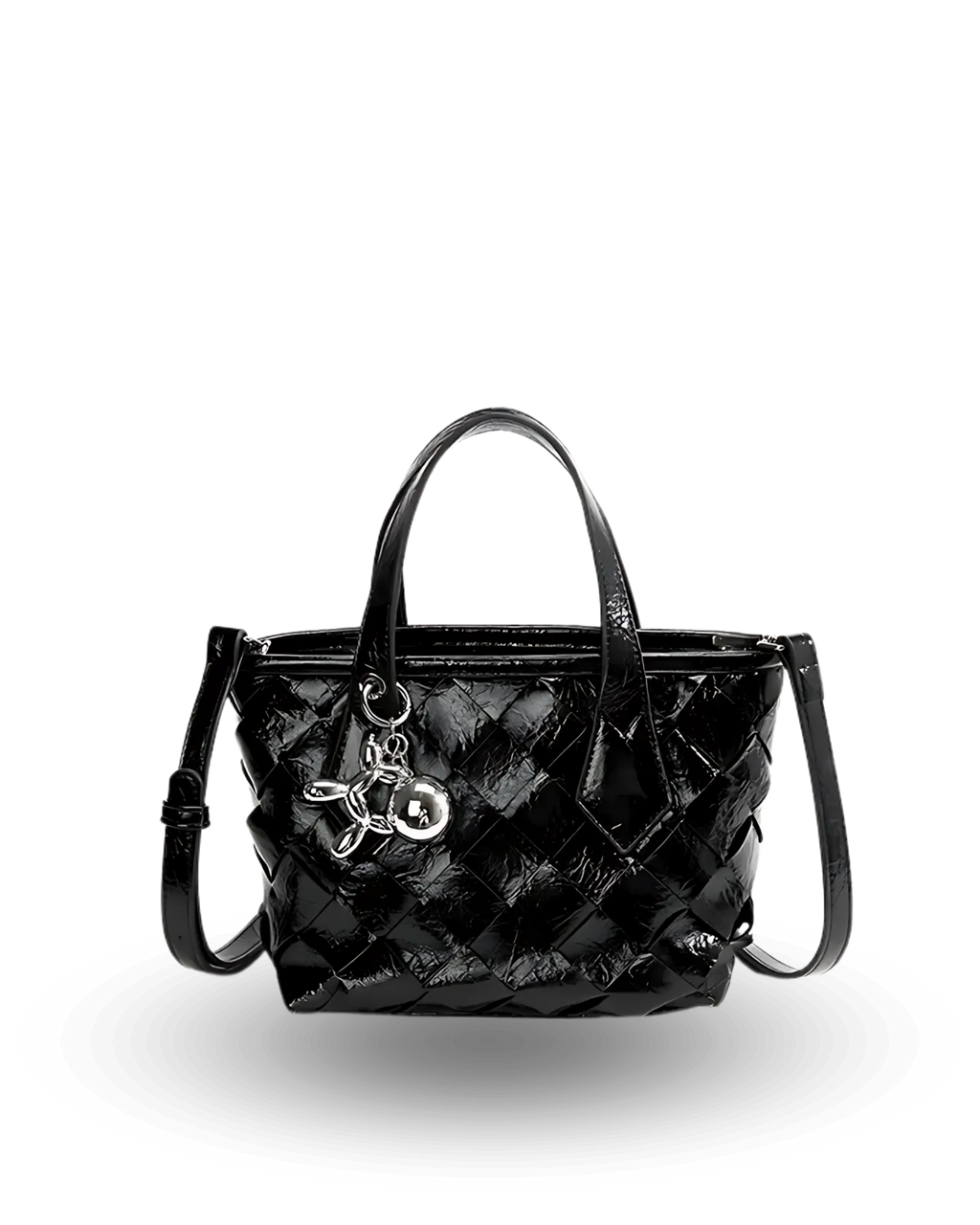 Black quilted patent leather handbag with dual top handles, detachable crossbody strap, and silver charm keychain accent.