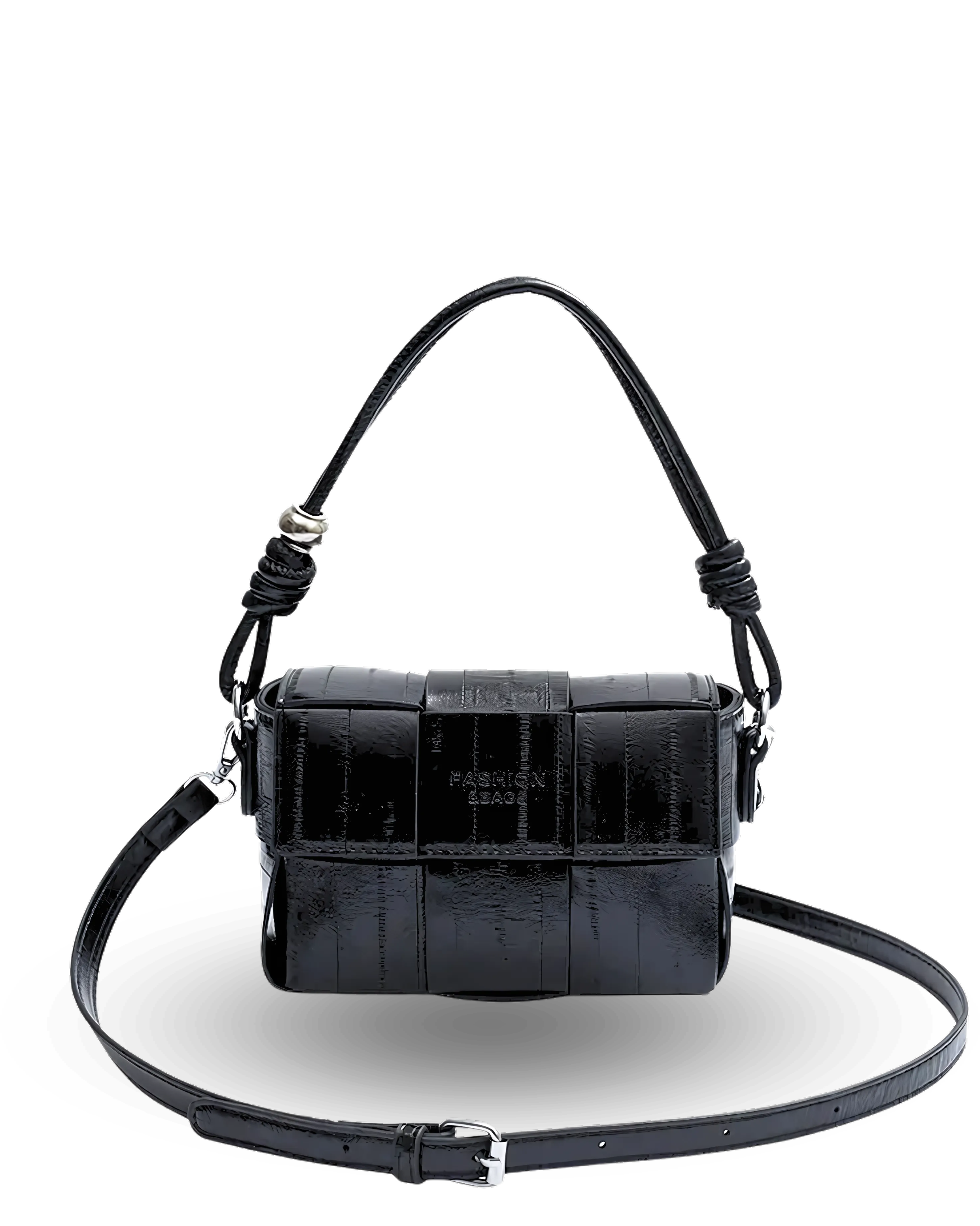 Black handbag with textured surface and braided handle on a white background