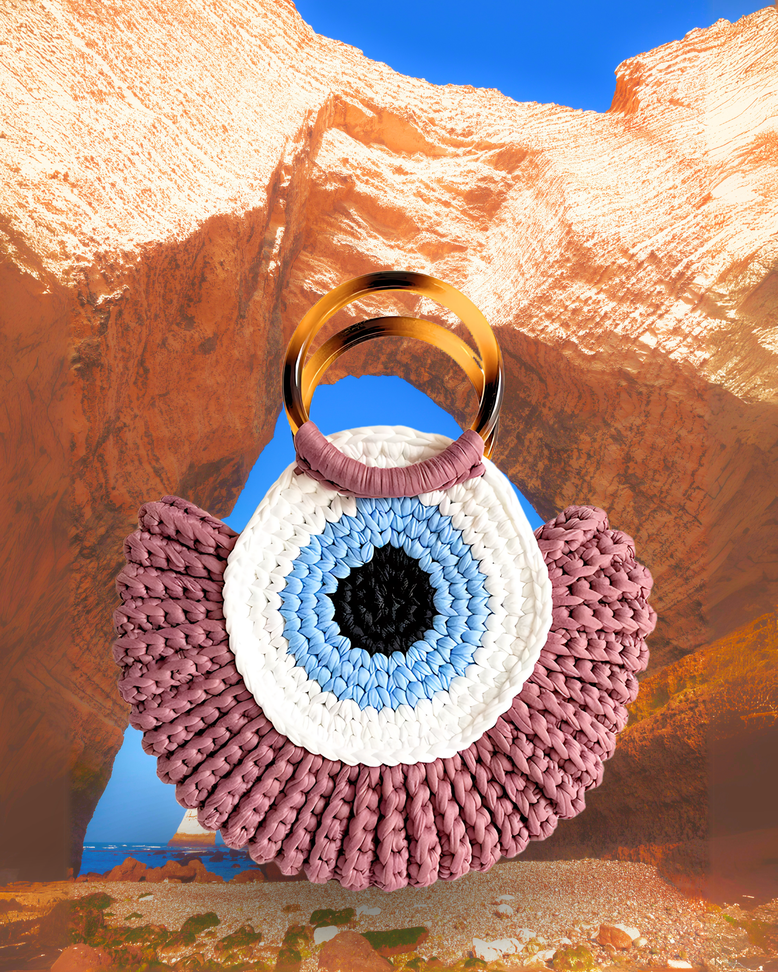 Round woven crochet handbag with layered fan-shaped black edges, evil eye design, and dual circular resin handles. dusty pink color eye