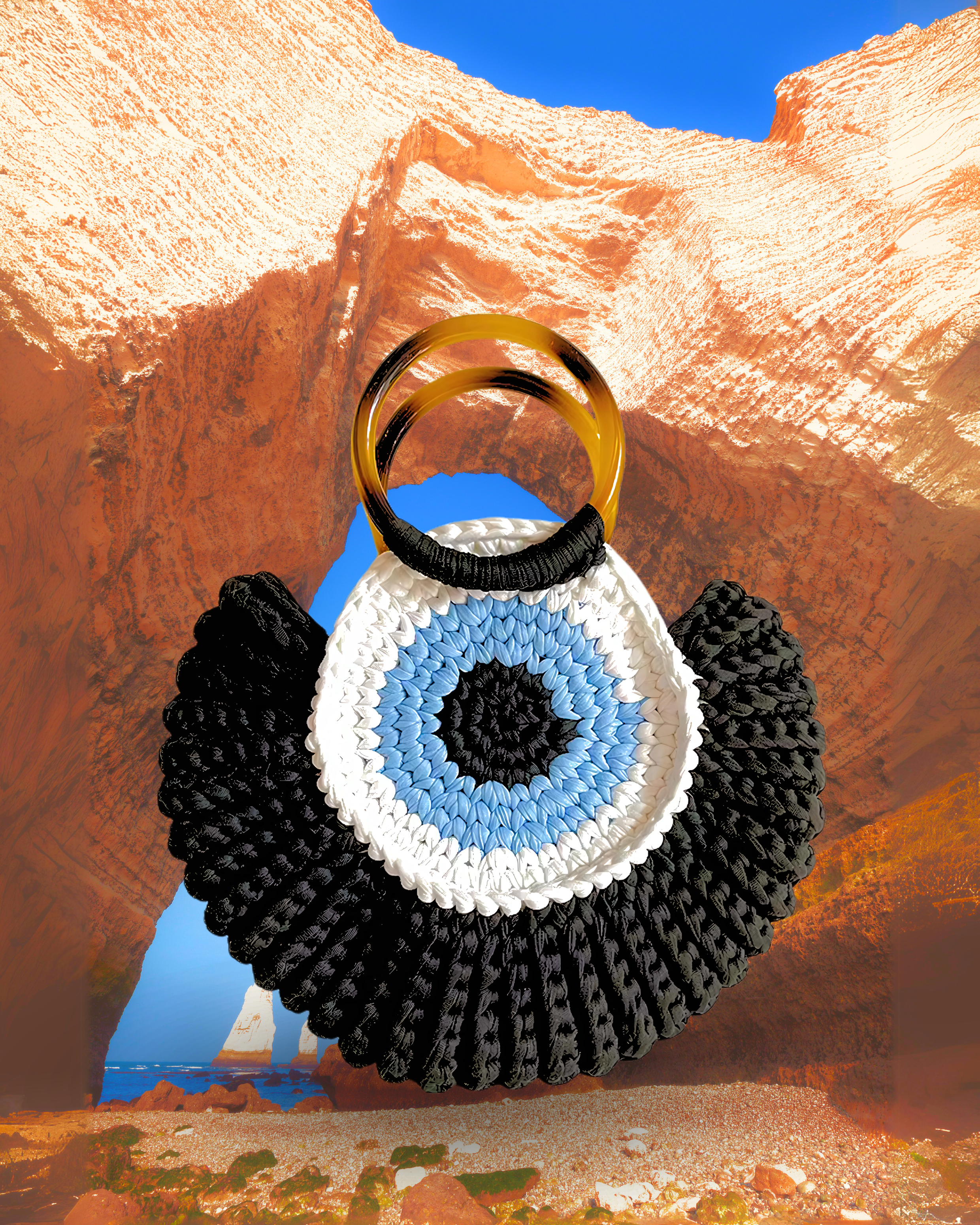 Round woven crochet handbag with layered fan-shaped black edges, evil eye design, and dual circular resin handles. Black color eye