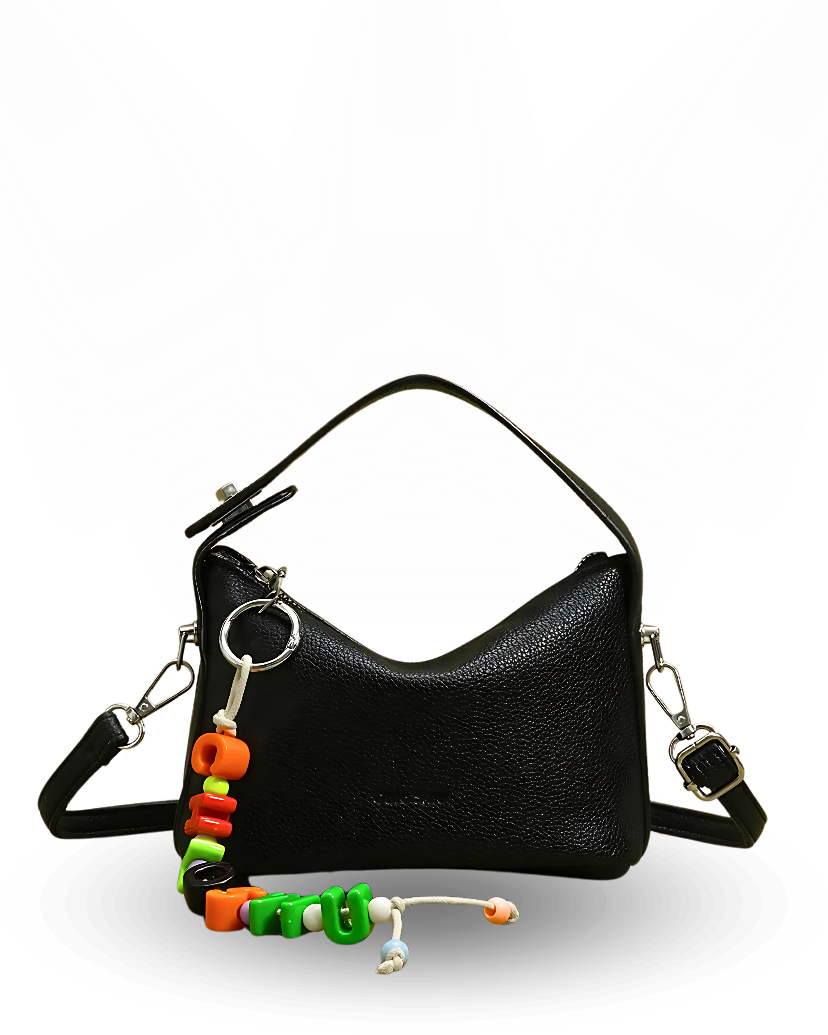 Black handbag with colorful keychain on a white background