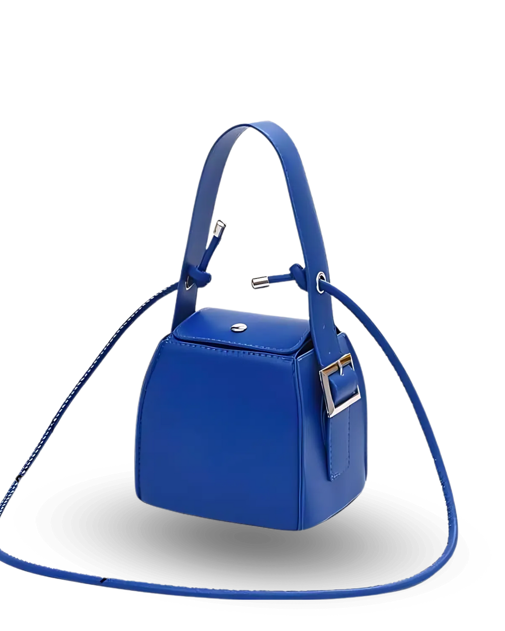 Royal blue structured cube handbag with top handle, flap closure, side buckle detail, and crossbody strap.