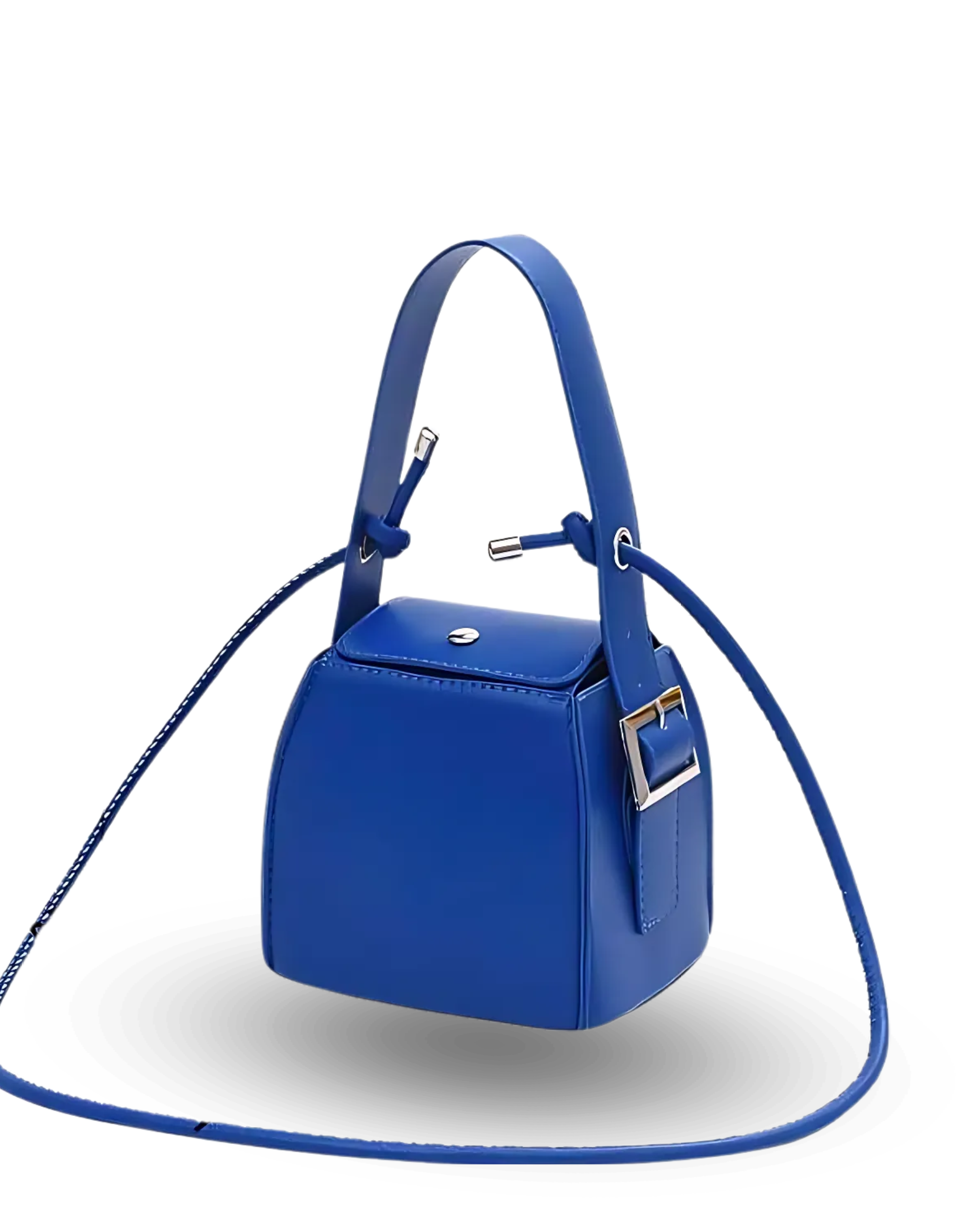 Royal blue structured cube handbag with top handle, flap closure, side buckle detail, and crossbody strap.