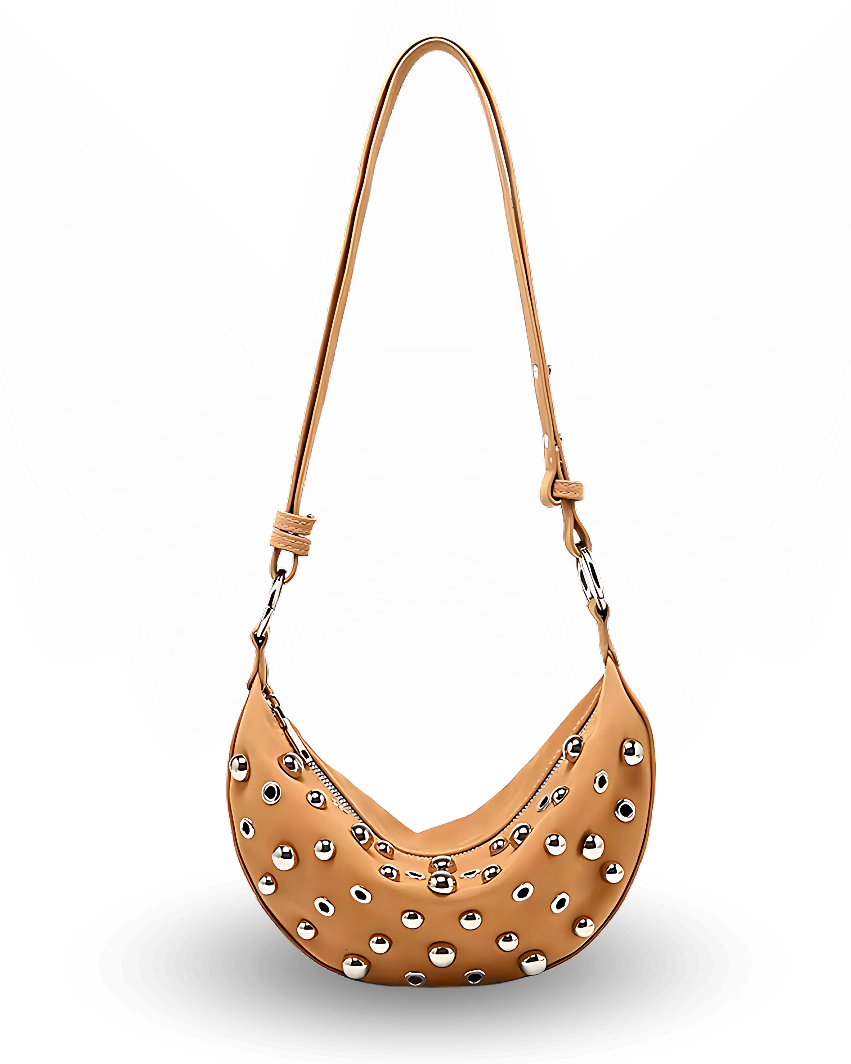 Curved crossbody sling bag made form vegan suede in autumn tan colours with a top zipper closure, adjustable shoulder strap, and metallic studded accents across the front