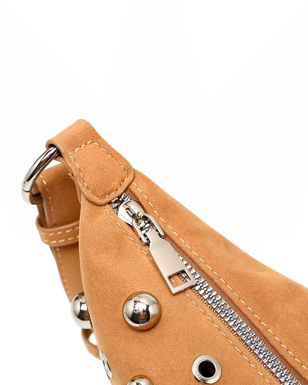 Curved crossbody sling bag made form vegan suede in autumn tan colours with a top zipper closure, adjustable shoulder strap, and metallic studded accents across the front