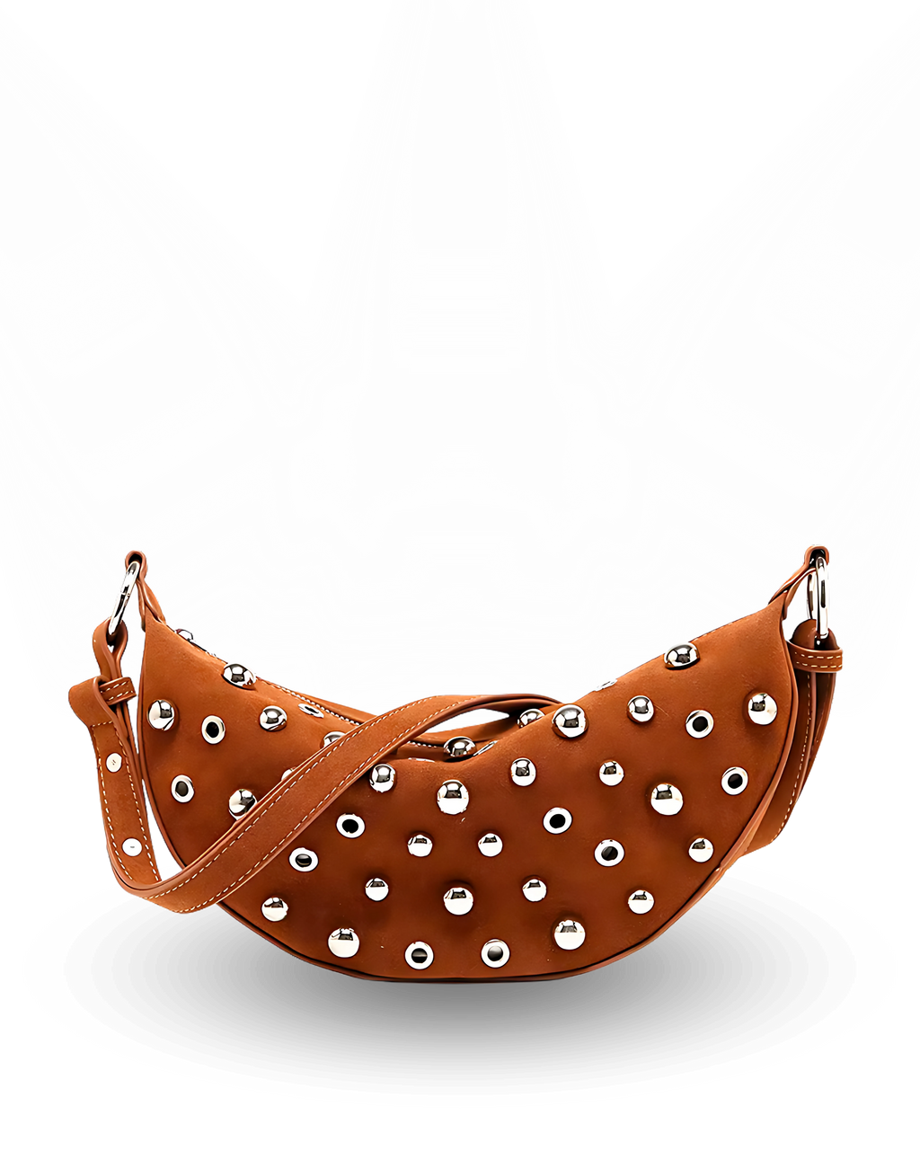 Curved crossbody sling bag made form vegan suede in autumn tan colours with a top zipper closure, adjustable shoulder strap, and metallic studded accents across the front.