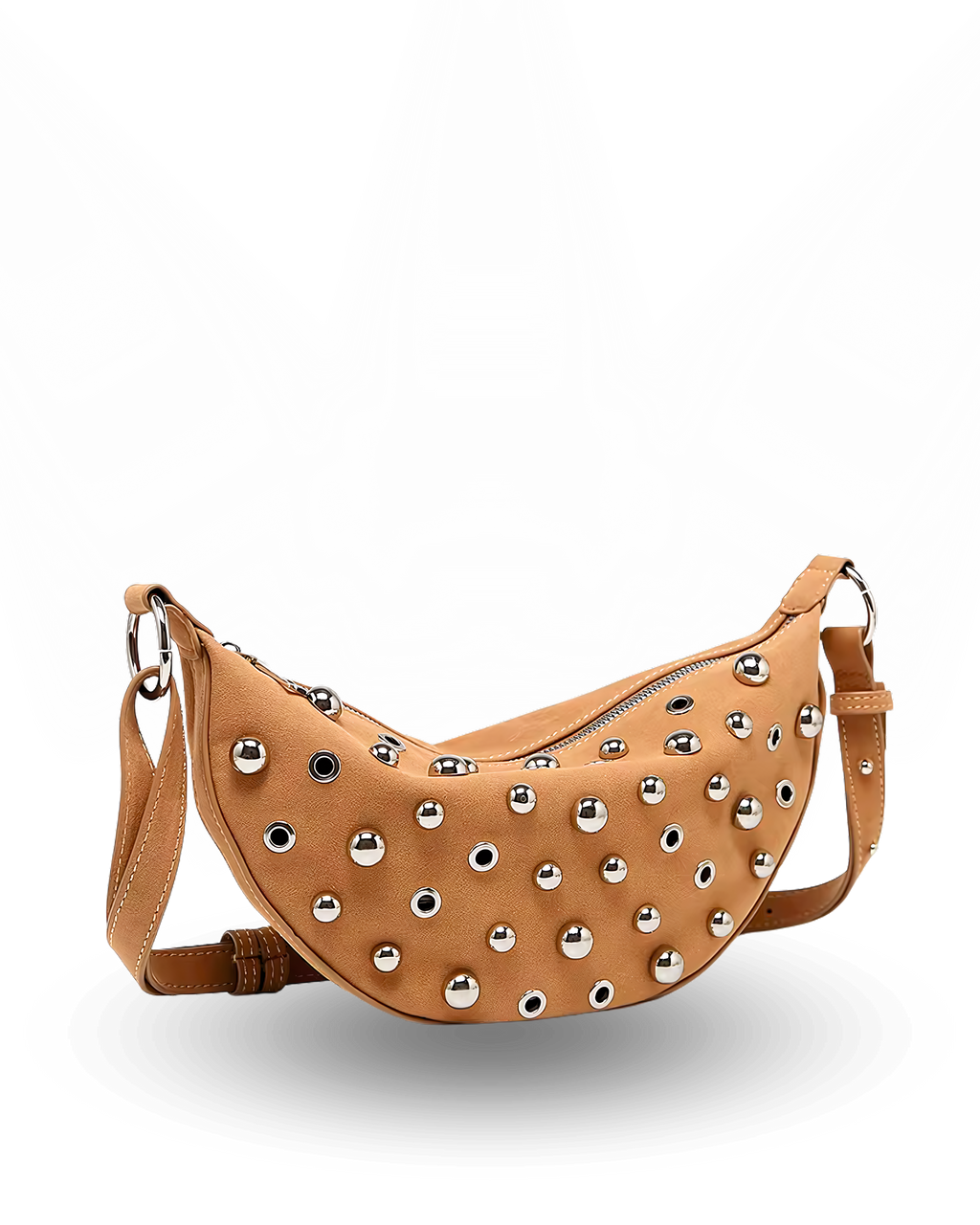 Curved crossbody sling bag made form vegan suede in autumn tan colours with a top zipper closure, adjustable shoulder strap, and metallic studded accents across the front