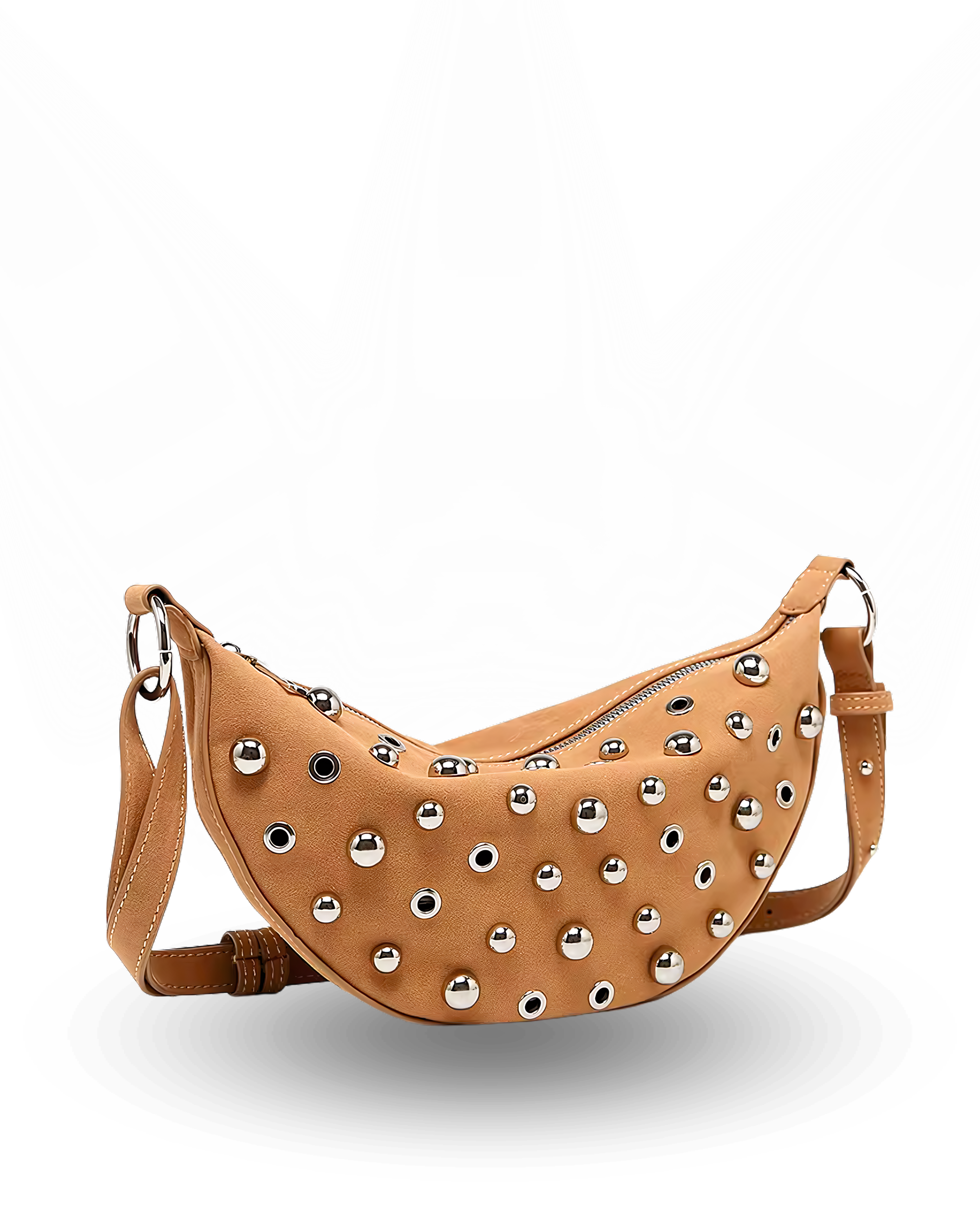 Curved crossbody sling bag made form vegan suede in autumn tan colours with a top zipper closure, adjustable shoulder strap, and metallic studded accents across the front
