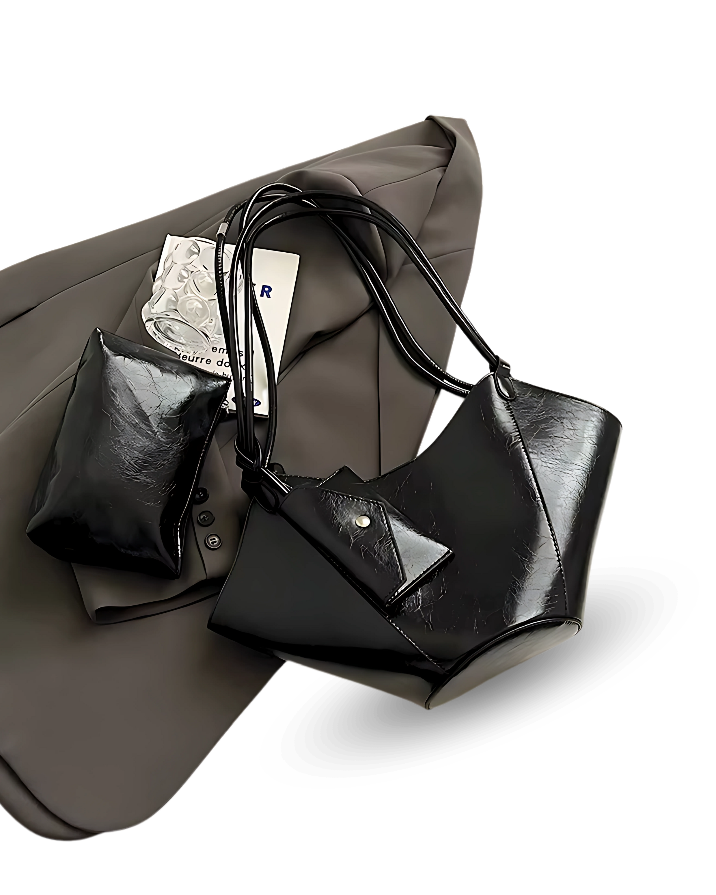 Unique black vegan leather handbag with sculpted, winged sides, dual shoulder straps, and a matching pouch accessory