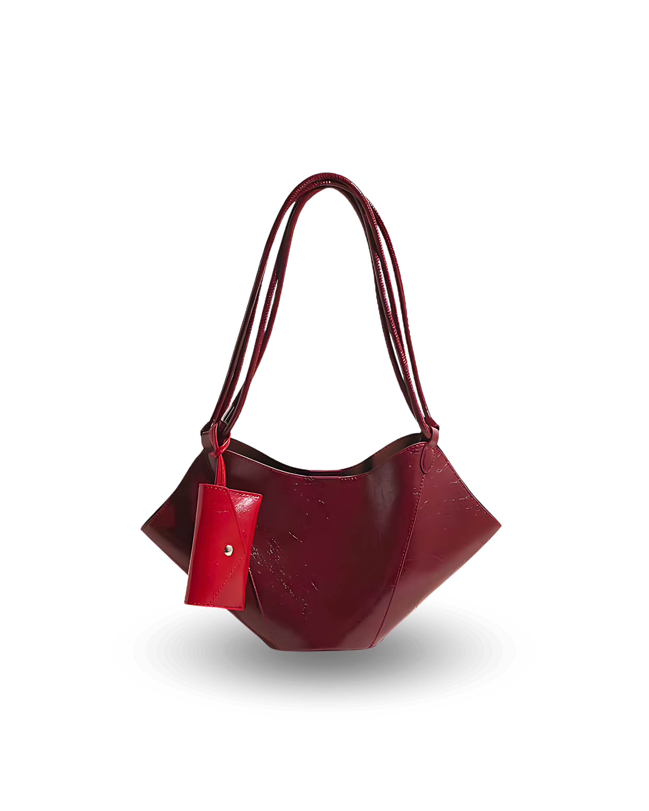 Unique deep red vegan leather handbag with sculpted, winged sides, dual shoulder straps, and a matching pouch accessory