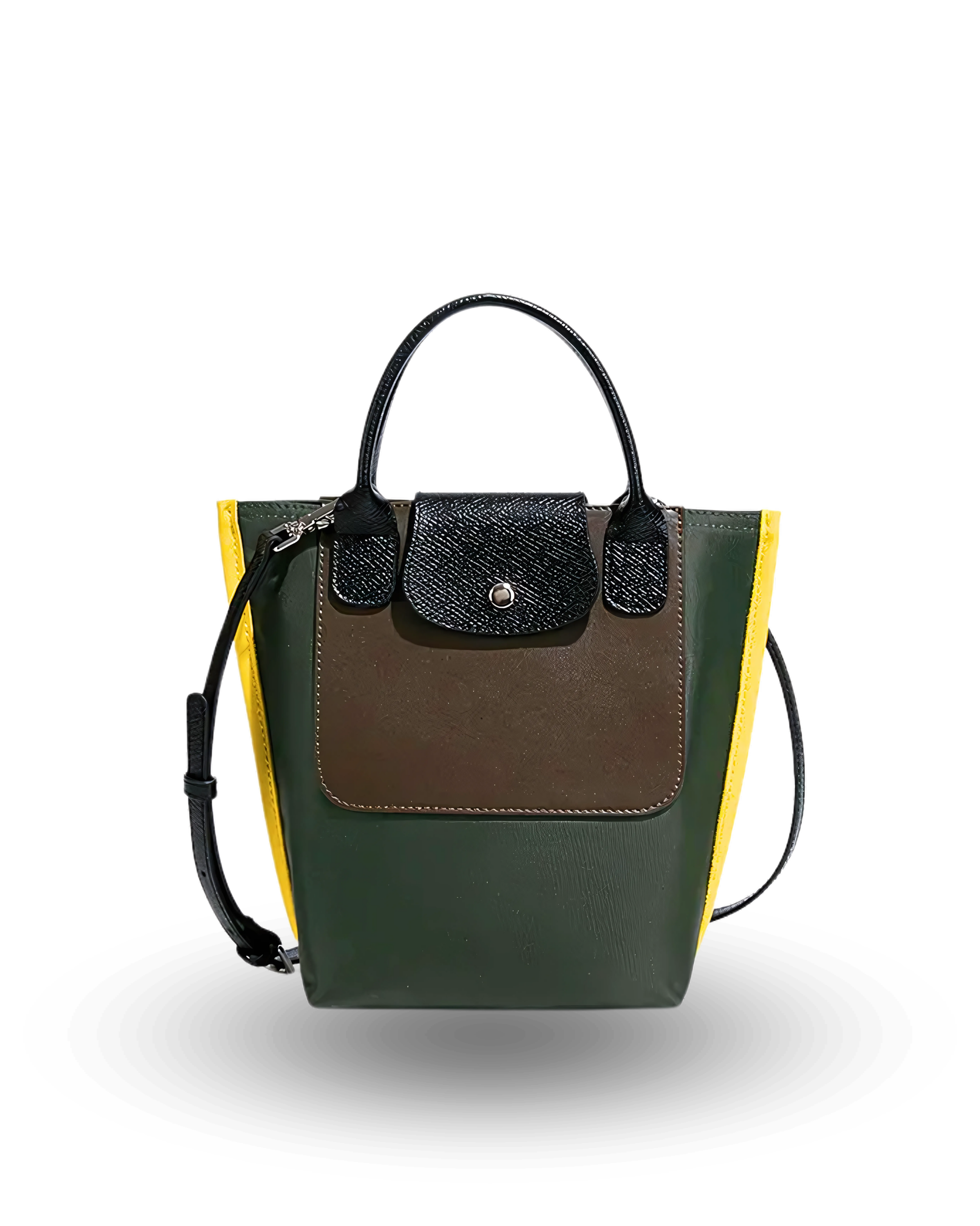 Mini tote crossbody handbag with a structured design, featuring a dark green body, brown front pocket, black textured flap with silver button, yellow side panels, and black top handles with adjustable shoulder strap.